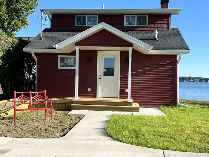 Front entrance, walkway, and accessibility ramp